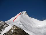 
From the plateau (6694m), the route ascends another snow slope to a rock band (6960m)
